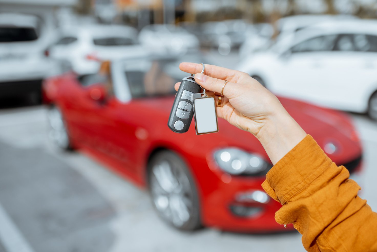 Woman Holding Car Keys of New Vehicle 